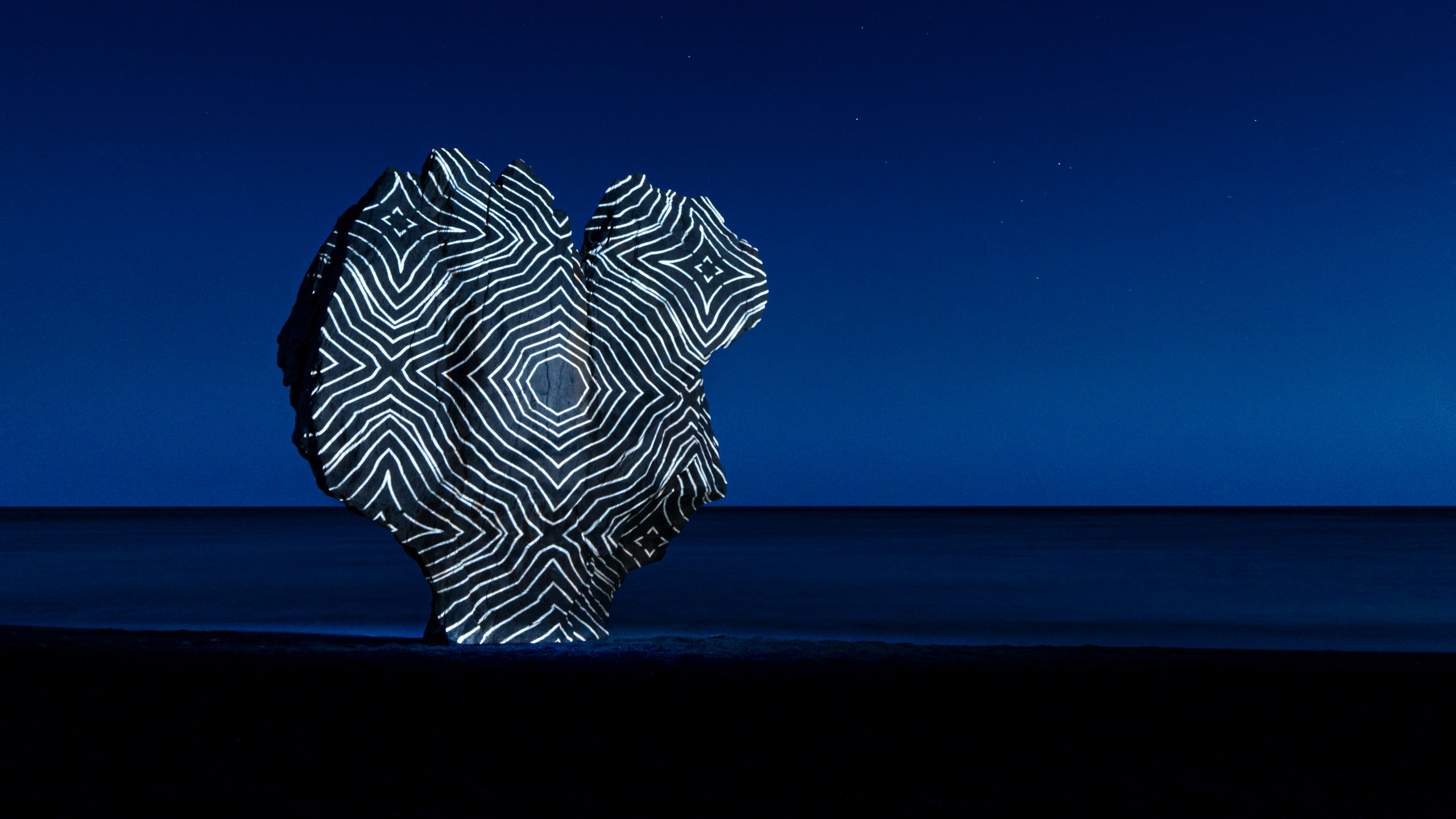 Heart shaped rock with mesmerizing pattern land art installation