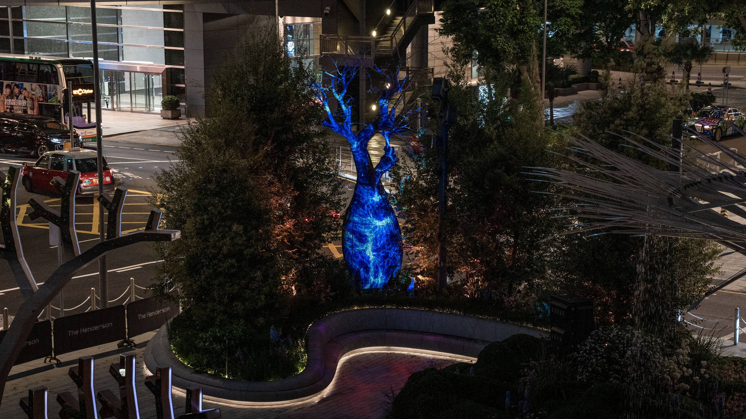 Permanent tree light installation integrated into architecture at The Henderson Hong Kong